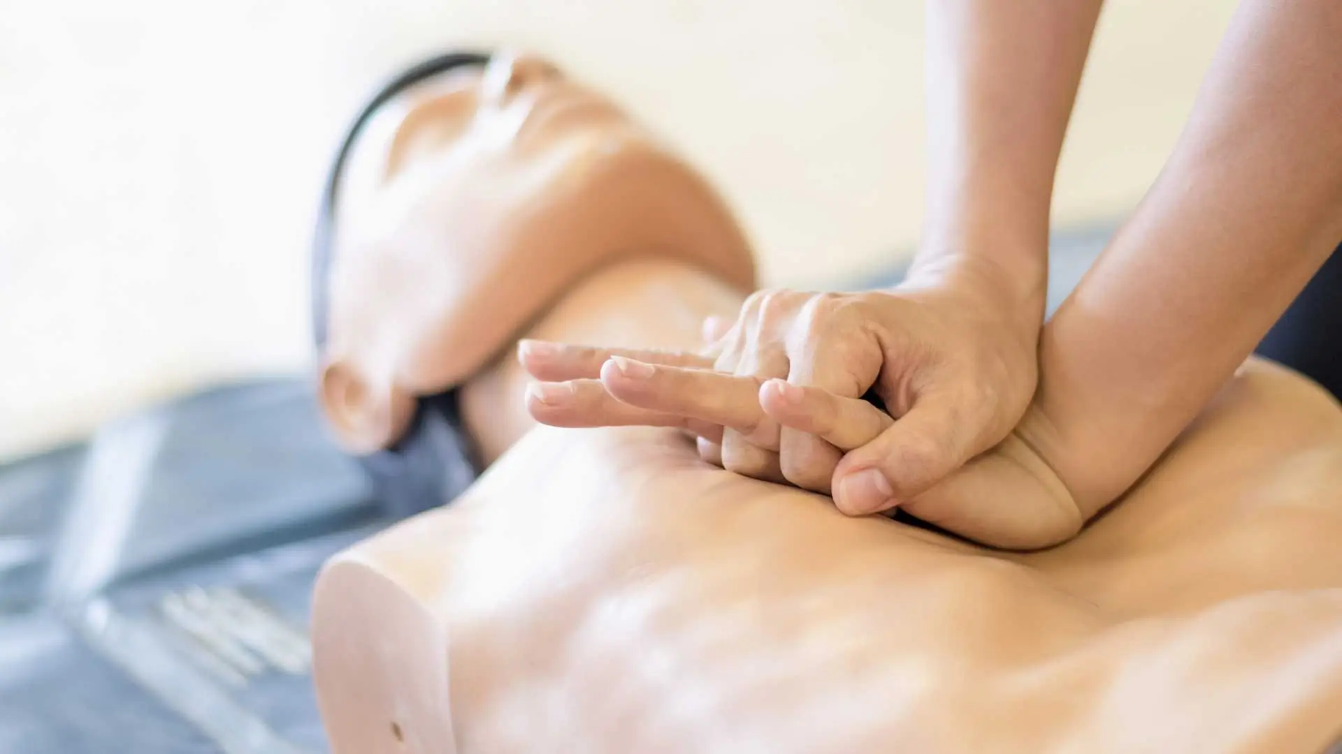 CPR and First Aid class giving CPR to a dummy in Ruskin, FL.