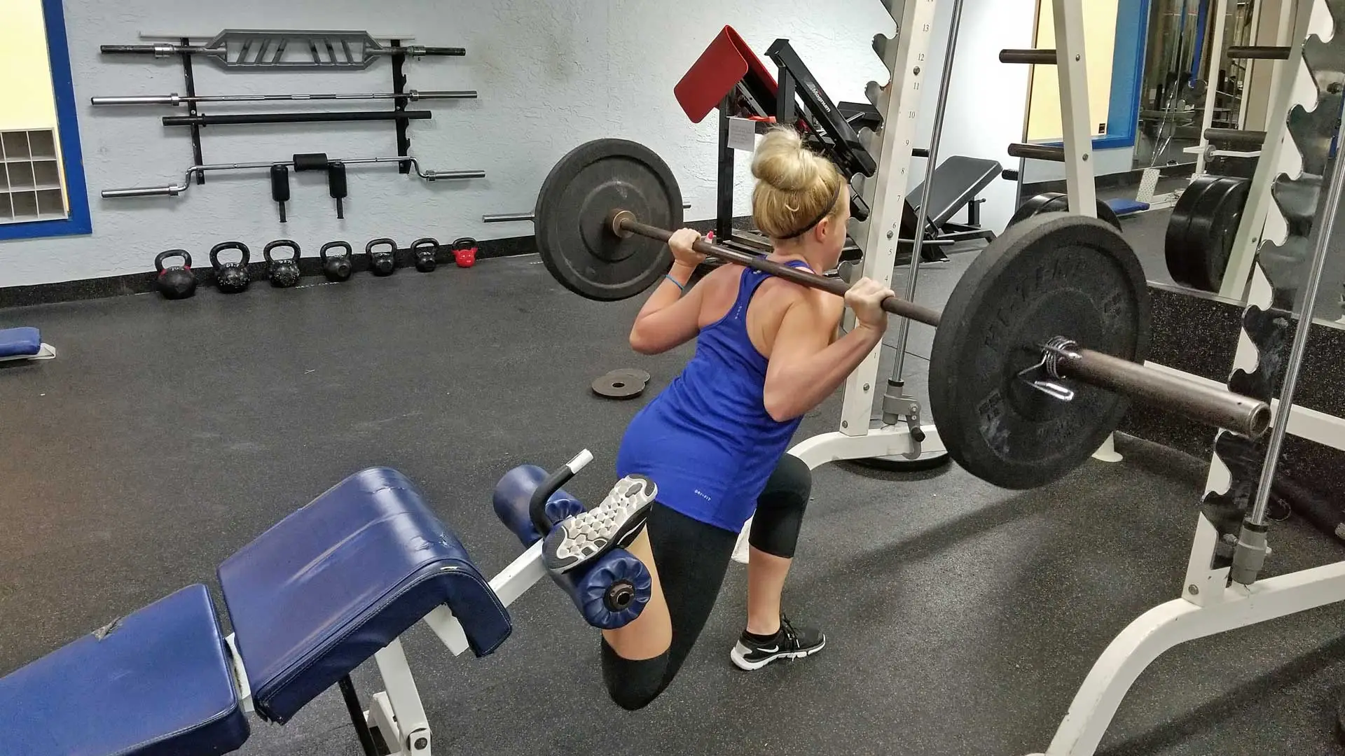 One legged bulgarian squats endurance strength training in Ruskin, FL .