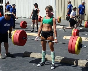 Female during a dead lift at an Apollo Beach gym.