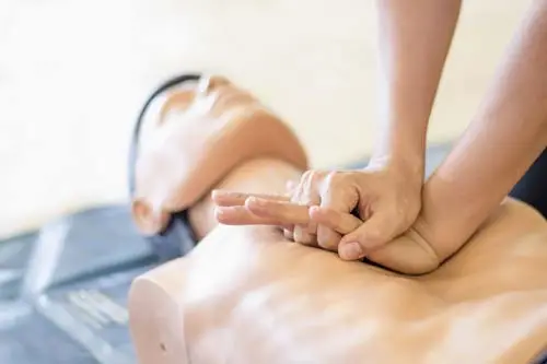 CPR being performed on a dummy during a CPR class in Ruskin, FL. 