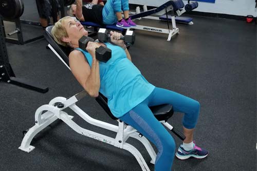 Mature athlete working out at the gym in Apollo Beach, FL.